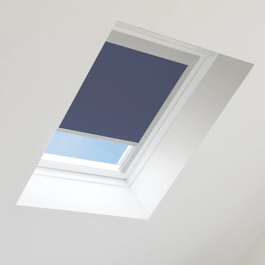 Blue roof window blind on a skylight with a clear sky background